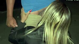 my wife giving it to another on the beach sand