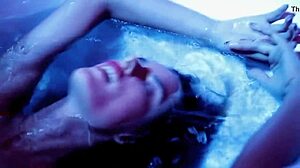 Alessandra Ambrosio's Striking Striptease Performance