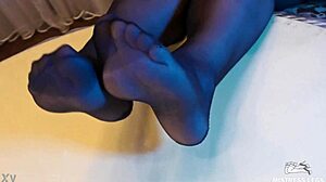 sexy goddess in BLACK PANTYHOSE teases with FEET