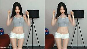 Korean girl performs sexy dance revealing big tits