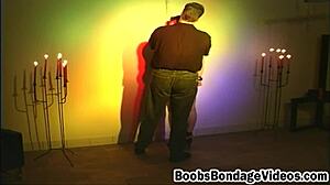 Pale redhead bound by master in BDSM