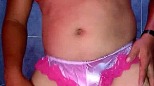 Mexican model dances in satin bra and panties.