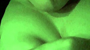 Sucking lollipop while playing with wet tits