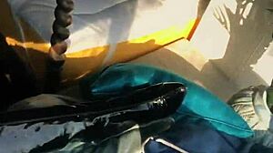 Woman Shows Off In Wetlook Suit And Boots!