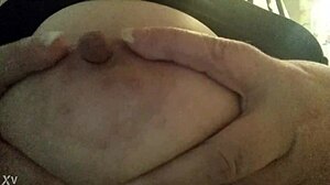 big beautiful woman with large breasts and nipples wearing rubber