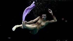 Aneta Shows Big Tits In Purple Dress Underwater In Pool