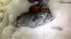 The brunette feels sensual in the bathtub, showing her big pussy.