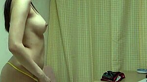 ATHLETIC ASIAN STRIPS NAKED