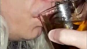 Crossdresser drinks pee