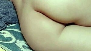 Chinese milf masturbates