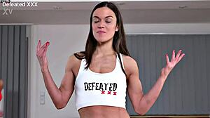 Female wrestling scissorholds submission